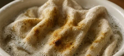 Чем почистить кухонные полотенца от жира