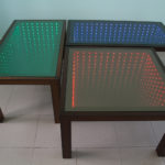 разноцветные столы с эффектом бесконечности