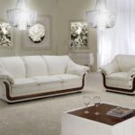белый кожаный диван с коричневой отделкой