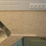 стык кухонной столешницы отделка фото