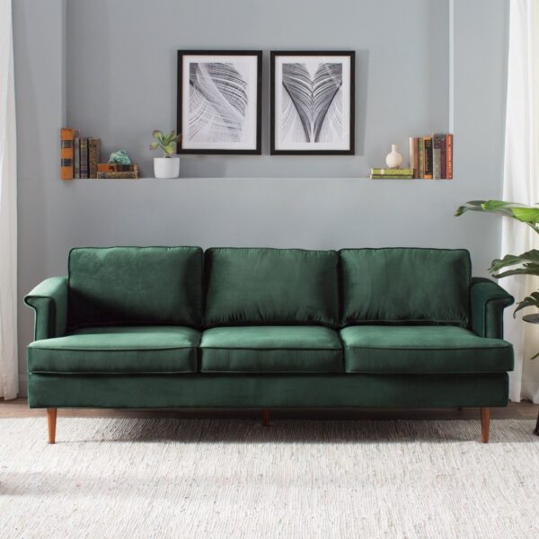Серый диван в зеленой комнате